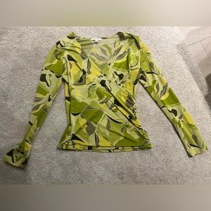Cool vintage green top in very stretchy yet fitted. Worn once!
